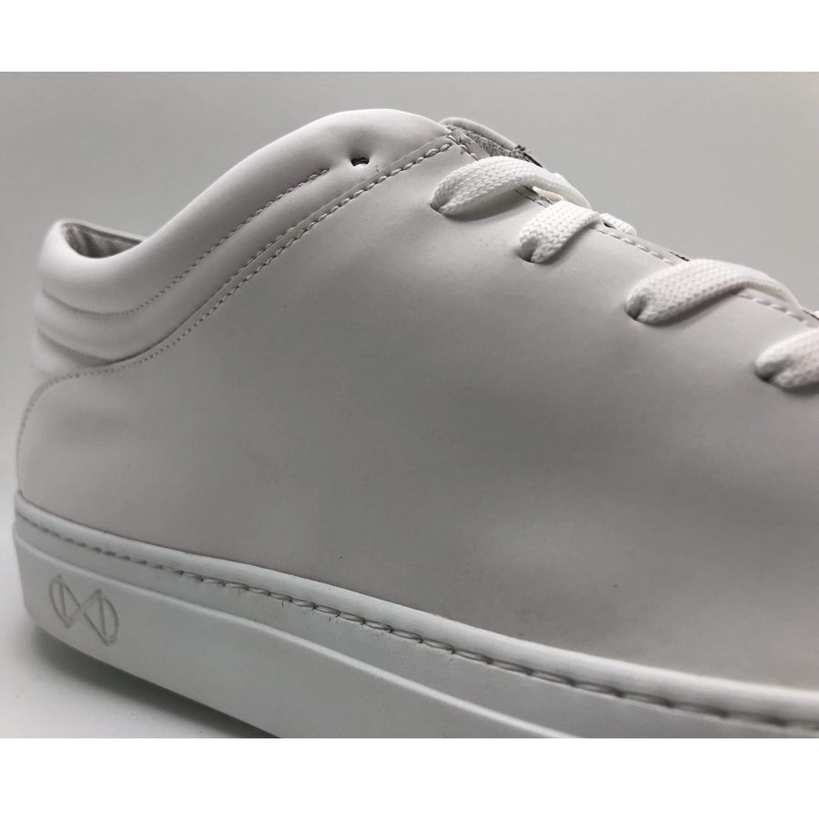 Sleek Low Vegan Sneakers in Reflective Glass 3M®.
